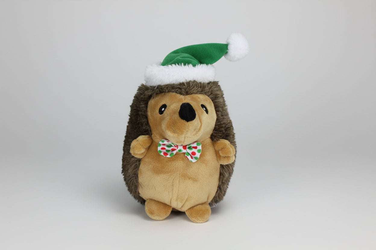 Multipet Hedgehog W/Bowtie & Green Santa Hat Dog Toy 8"